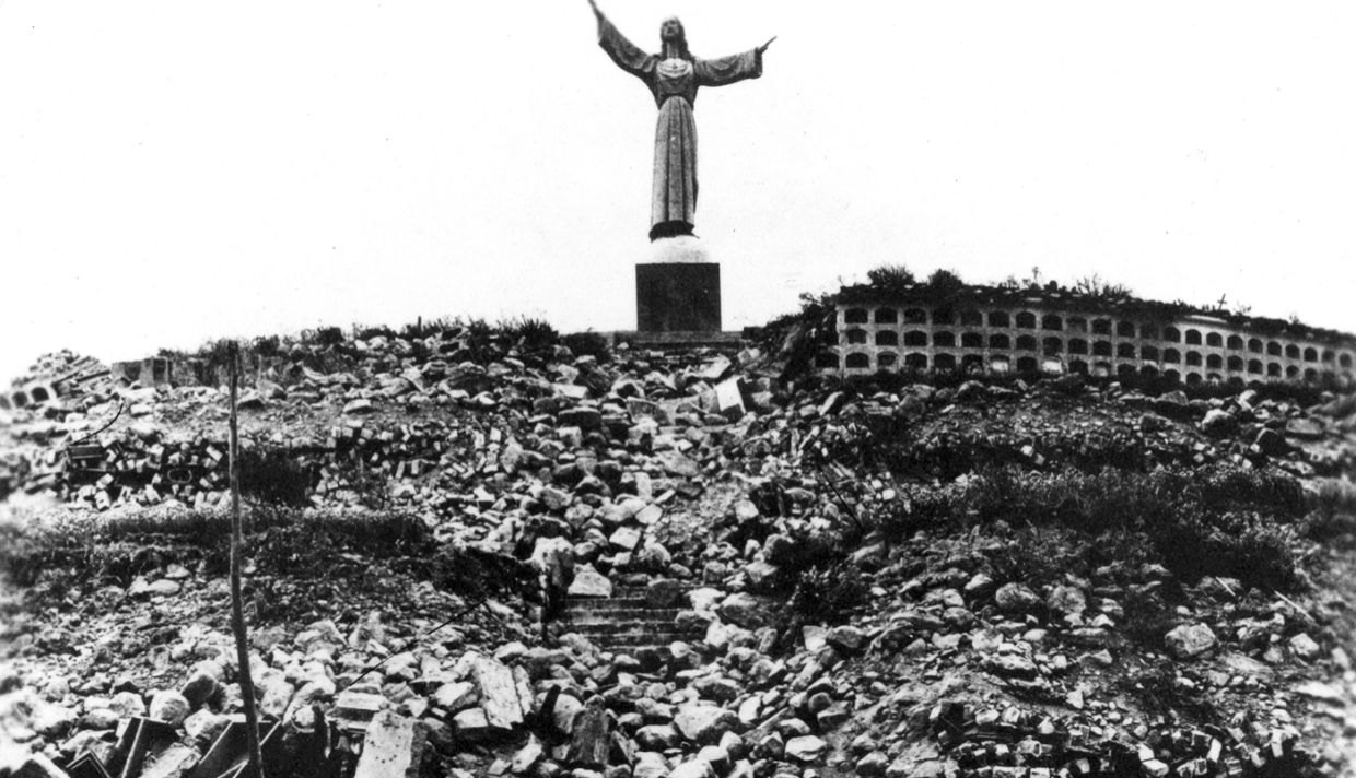 Historical photograph of Yungay cemetery and Christ statue after the 1970 earthquake and avalanche